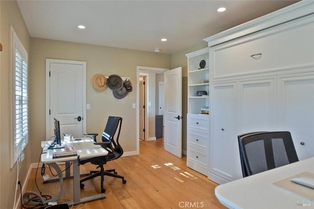 home office with light wood-type flooring