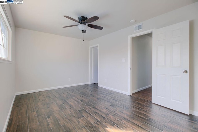 unfurnished room with ceiling fan