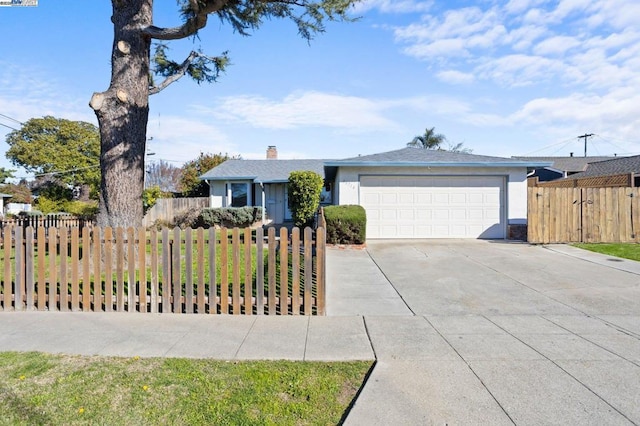 ranch-style home featuring a garage