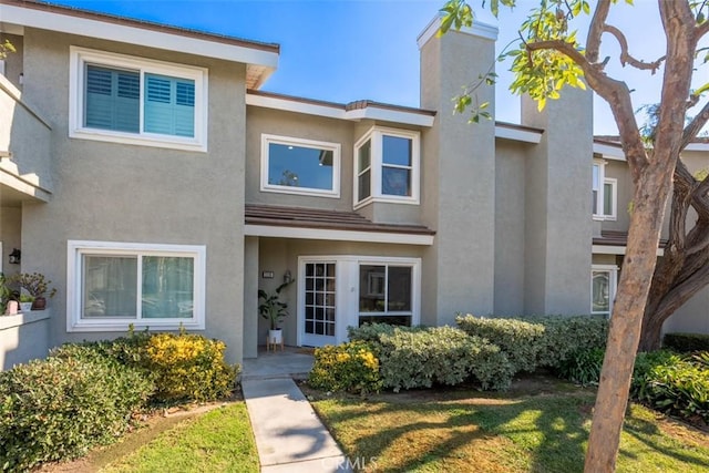 multi unit property featuring stucco siding