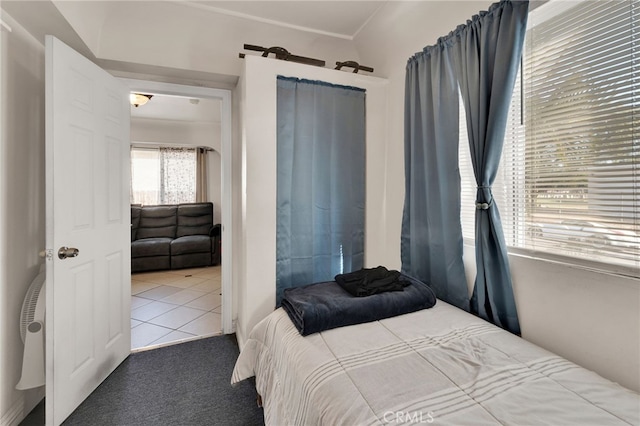 bedroom featuring tile patterned floors