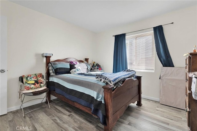 bedroom featuring light wood-type flooring