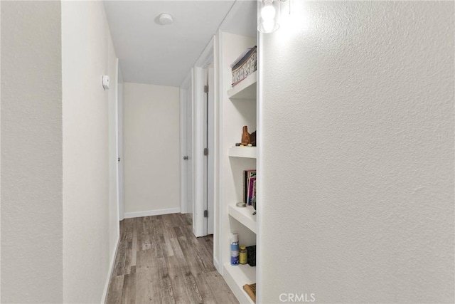 hallway featuring light wood-type flooring