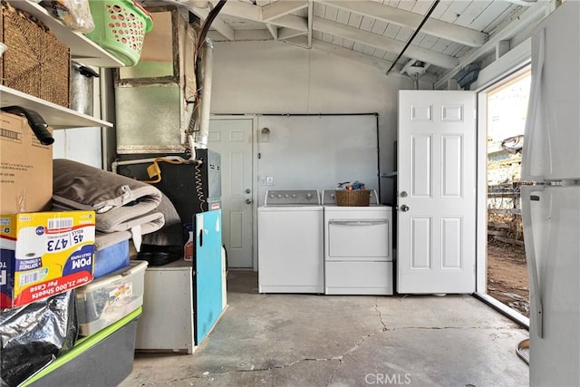 laundry room with separate washer and dryer and wood ceiling