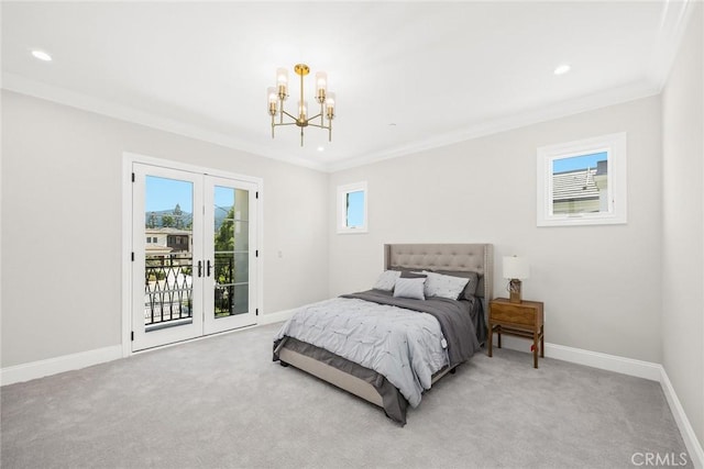 carpeted bedroom with ornamental molding, access to outside, and a notable chandelier