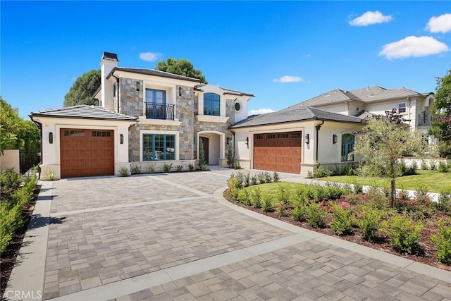 view of front of property with a garage