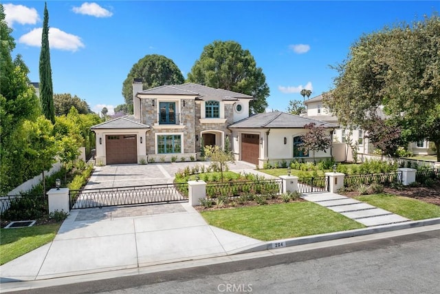 view of front of property featuring a garage