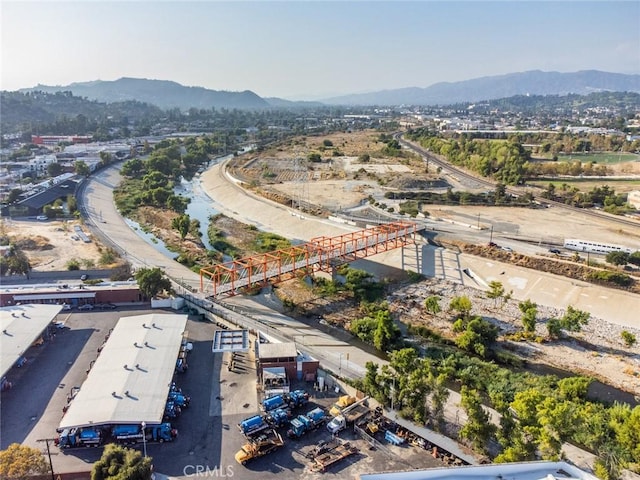 drone / aerial view featuring a mountain view