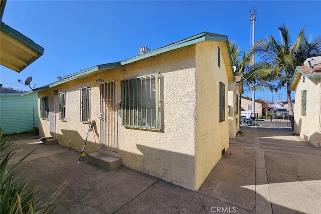 view of front of home featuring a patio