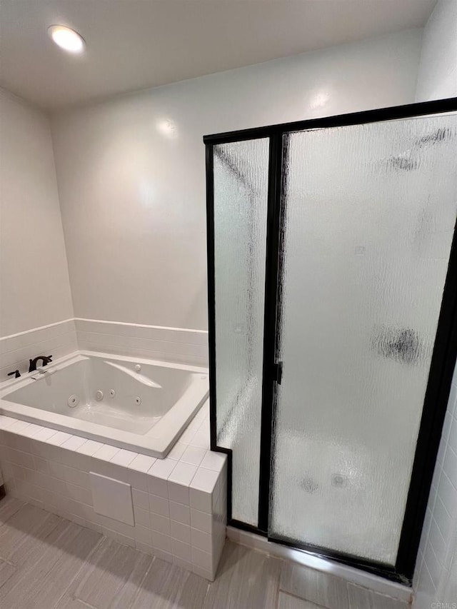 bathroom with independent shower and bath