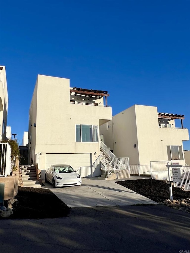 rear view of property with a garage