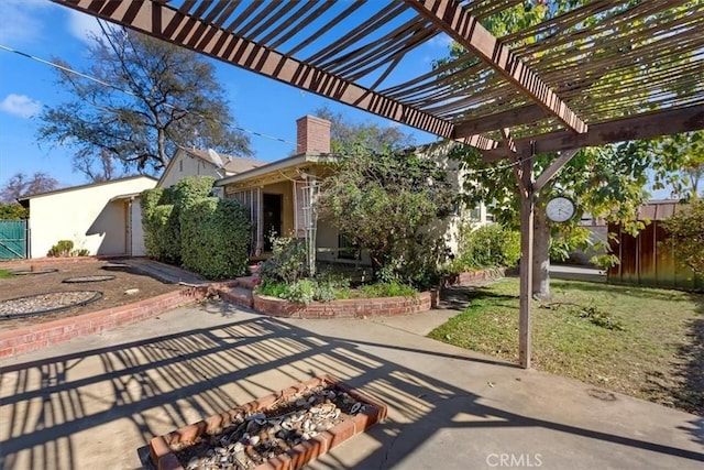 view of patio featuring a pergola