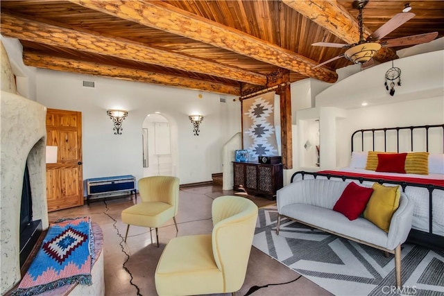 bedroom with beam ceiling and wood ceiling