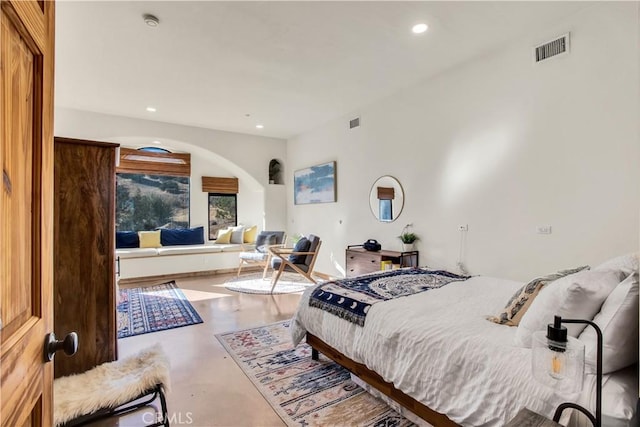 bedroom with concrete flooring