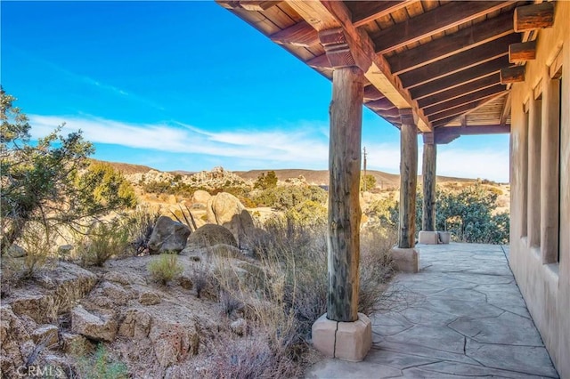 view of patio featuring a mountain view