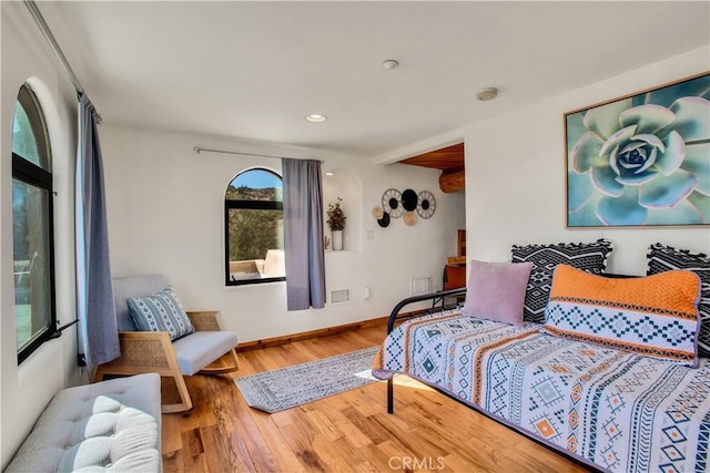 bedroom featuring hardwood / wood-style floors