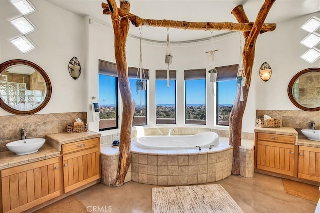 bathroom featuring tasteful backsplash and vanity