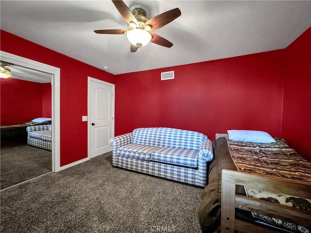 carpeted bedroom with ceiling fan