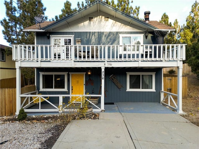 view of front facade with a balcony