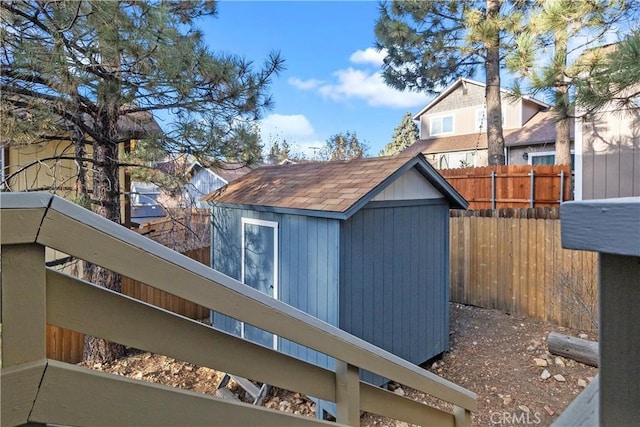 view of home's exterior featuring a shed