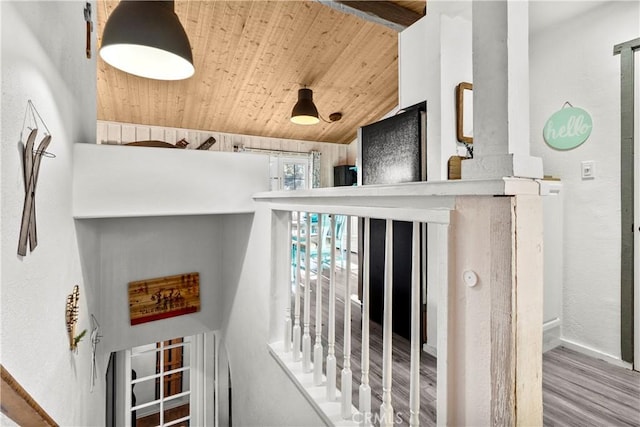 interior details featuring hardwood / wood-style floors and wooden ceiling