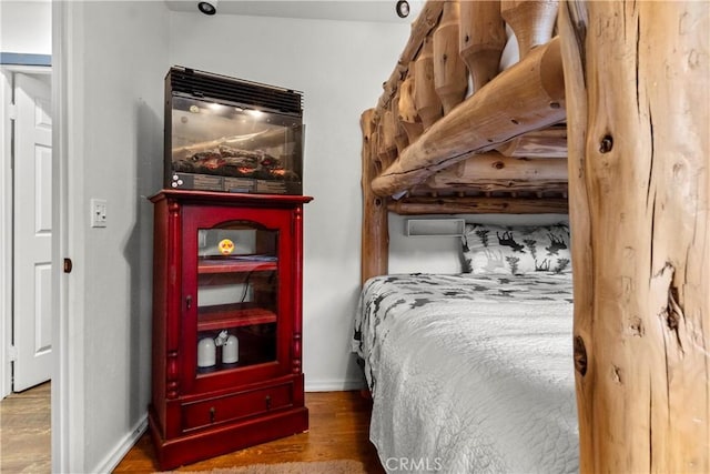 bedroom featuring hardwood / wood-style flooring