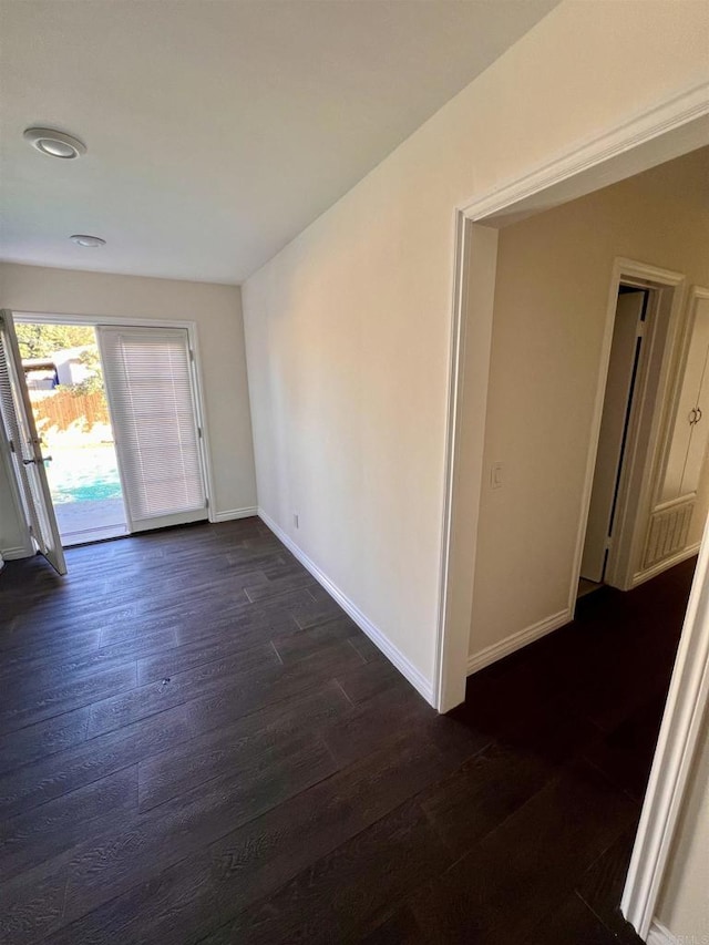 foyer entrance with dark hardwood / wood-style flooring