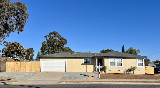 single story home featuring a garage