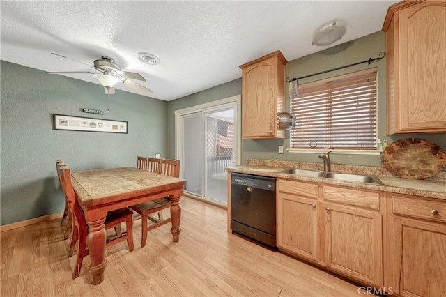 kitchen with light hardwood / wood-style floors, ceiling fan, light brown cabinets, dishwasher, and sink