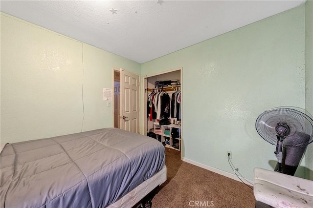 carpeted bedroom with a closet