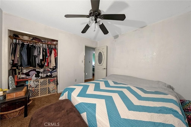 carpeted bedroom featuring a closet and ceiling fan