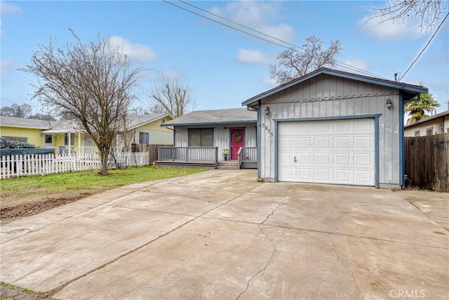 single story home featuring a front yard and a garage