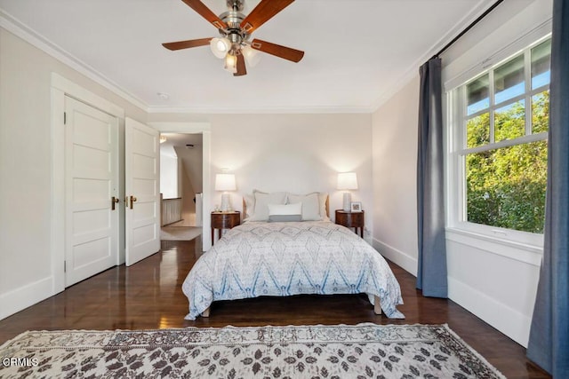 bedroom with ceiling fan, dark hardwood / wood-style flooring, and ornamental molding