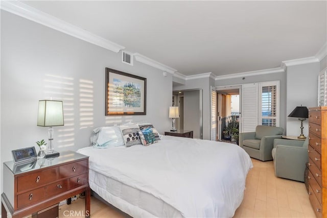 bedroom featuring light wood-type flooring and ornamental molding