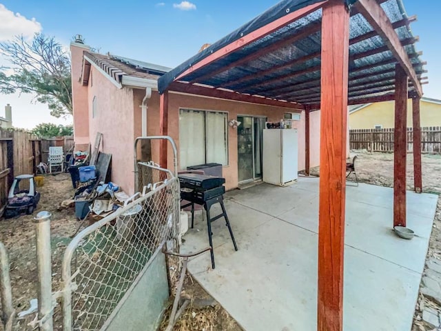 view of patio / terrace featuring a pergola