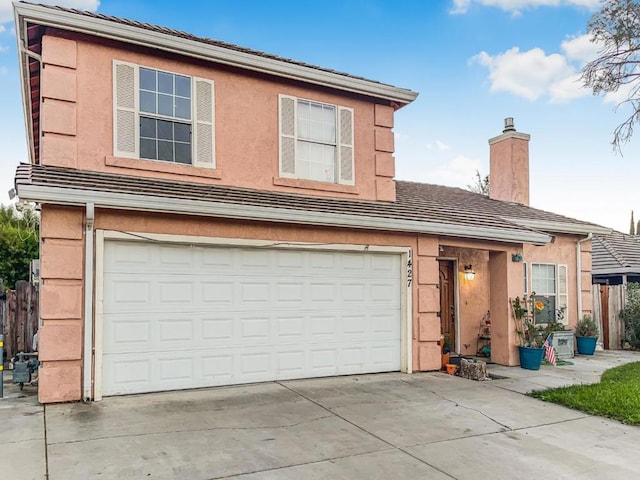 front of property featuring a garage