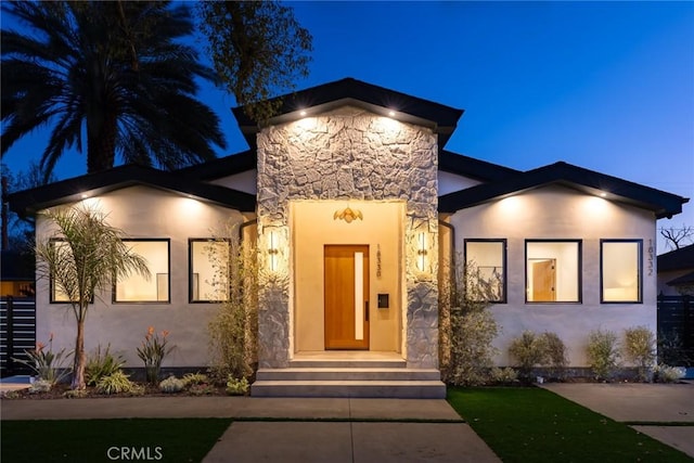 view of front of house featuring elevator