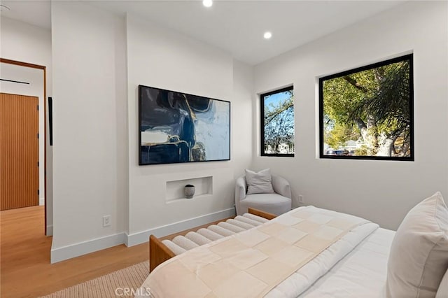 bedroom featuring hardwood / wood-style flooring