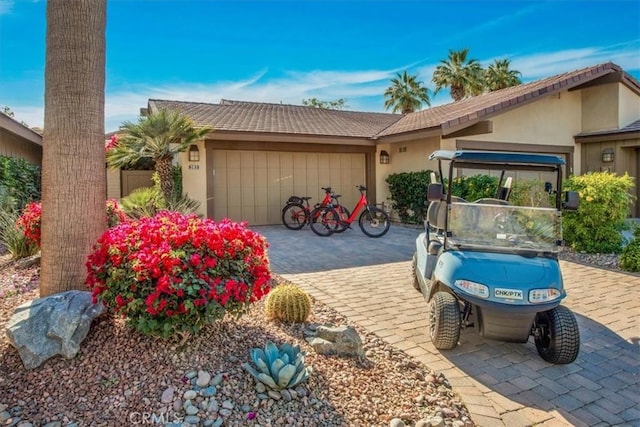 view of front of property with a garage