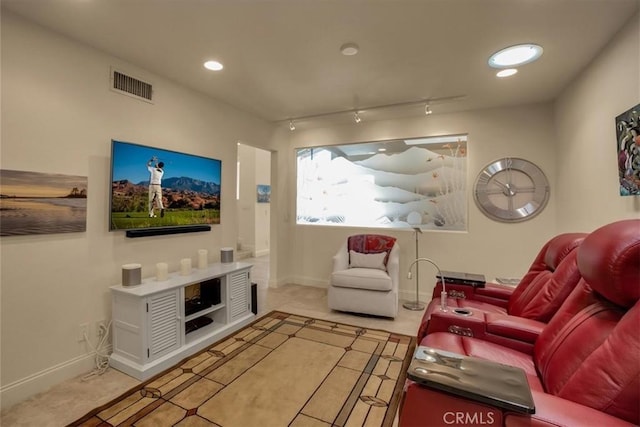 living room featuring track lighting