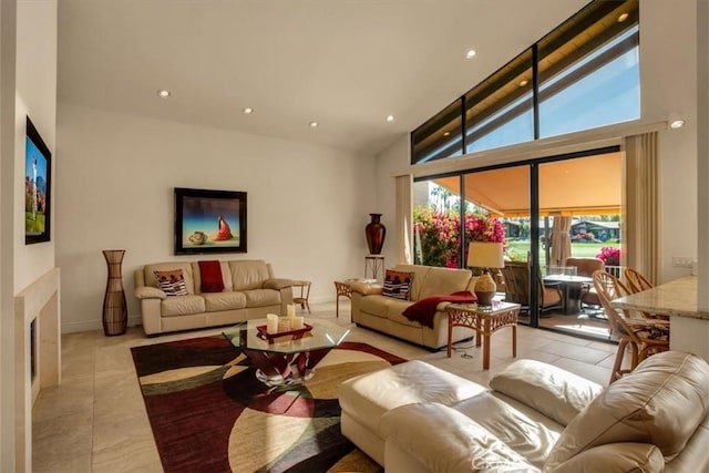 tiled living room featuring a high ceiling