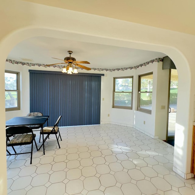 dining room featuring ceiling fan