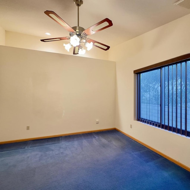 unfurnished room with ceiling fan and carpet floors