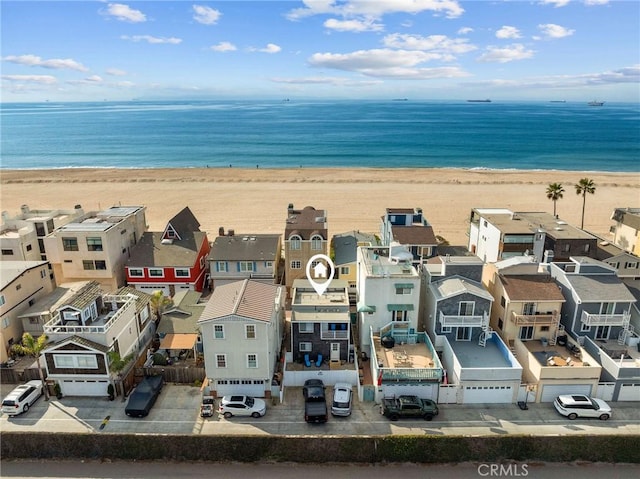 aerial view with a view of the beach and a water view