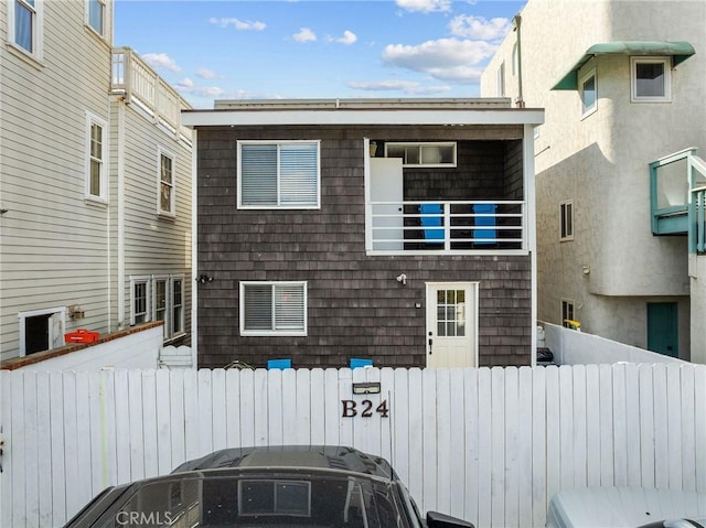 24B Surfside Ave, Surfside, CA 90743 - rear view of house featuring a balcony