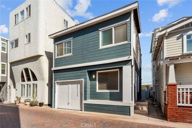 24B Surfside Ave, Surfside, CA 90743 - rear view of house featuring stucco siding