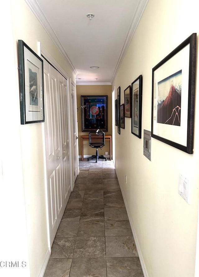 hallway featuring ornamental molding