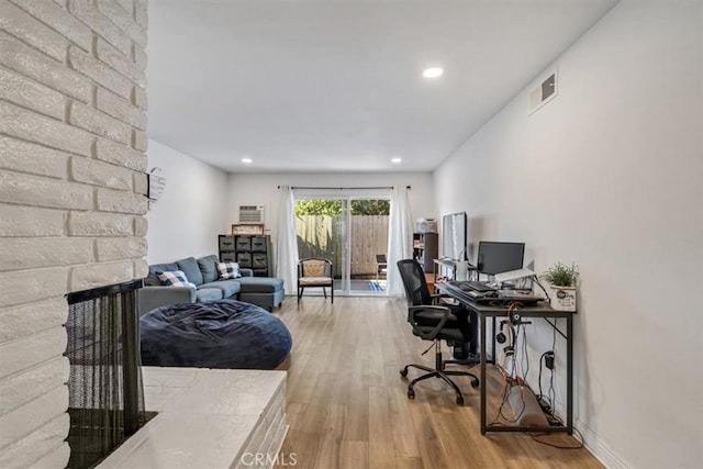 office with light hardwood / wood-style floors