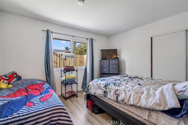 bedroom featuring light hardwood / wood-style floors