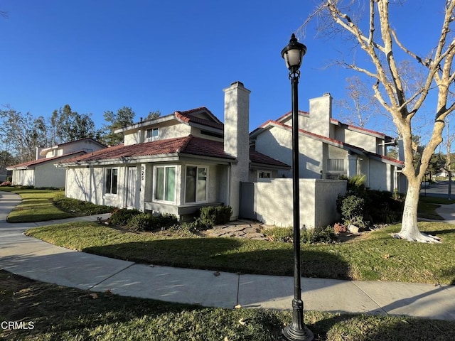 exterior space with a front yard